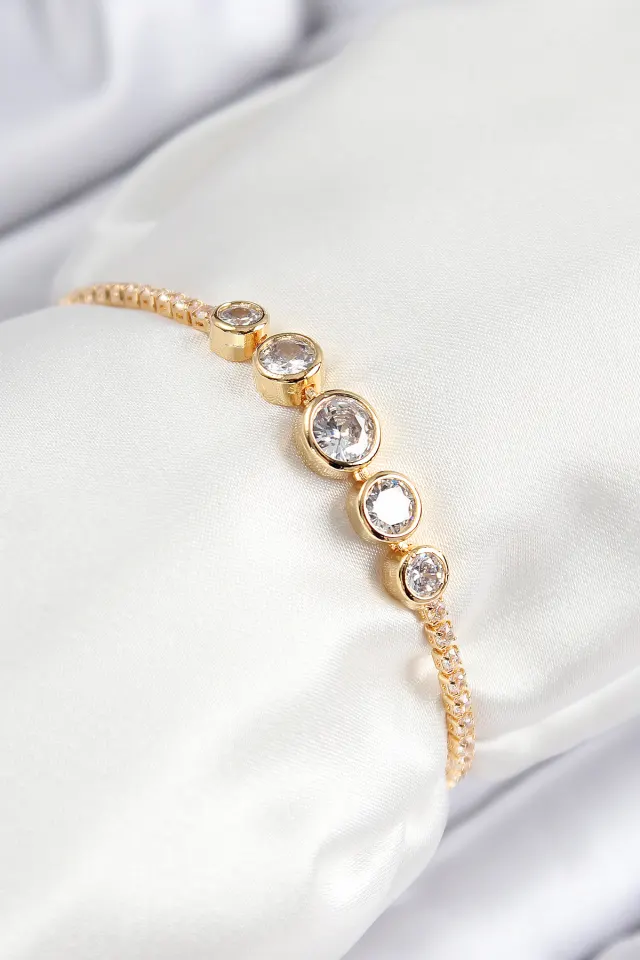 Pirinç Zirkon Taşlı Sıralı Daire Model Gold Renk Asansörlü Kadın Bileklik